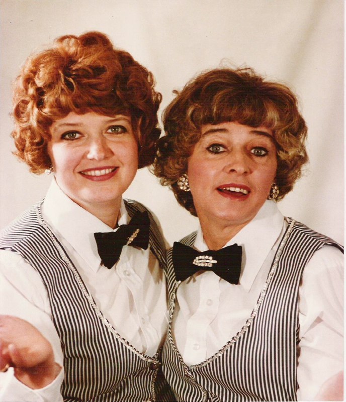 Vi Childs and her daughter Darby in striped vests and bow ties